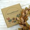 20-inch fall wreath adorned with brown magnolia leaves and small pomegranate berries, suitable for home, outdoor, farmhouse, porch, wall, and window d